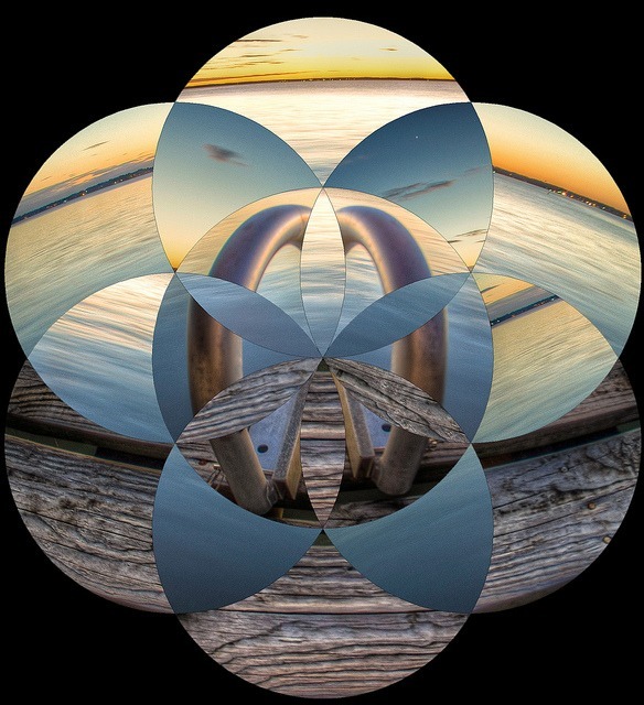 A mosaic image with overlapping circular sections features a metal handrail on a wooden dock, reminiscent of "Back to the Future," leading to a calm body of water. The sky displays a gradient of sunset colors, reflecting on the water's surface and creating a symmetrical visual effect.