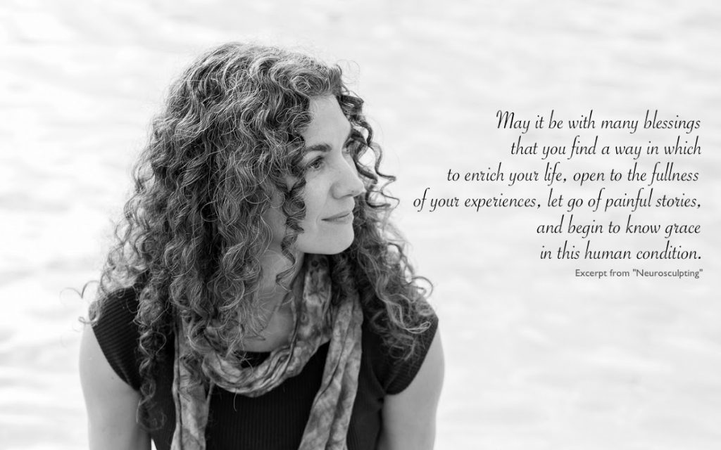 Black and white photo of a woman with curly hair, looking thoughtfully to the side. Text beside her reads: "May it be with many blessings that you find a way in which to enrich your life through brain training." Excerpt from 'Neurosculpting' by Shanti Medina.