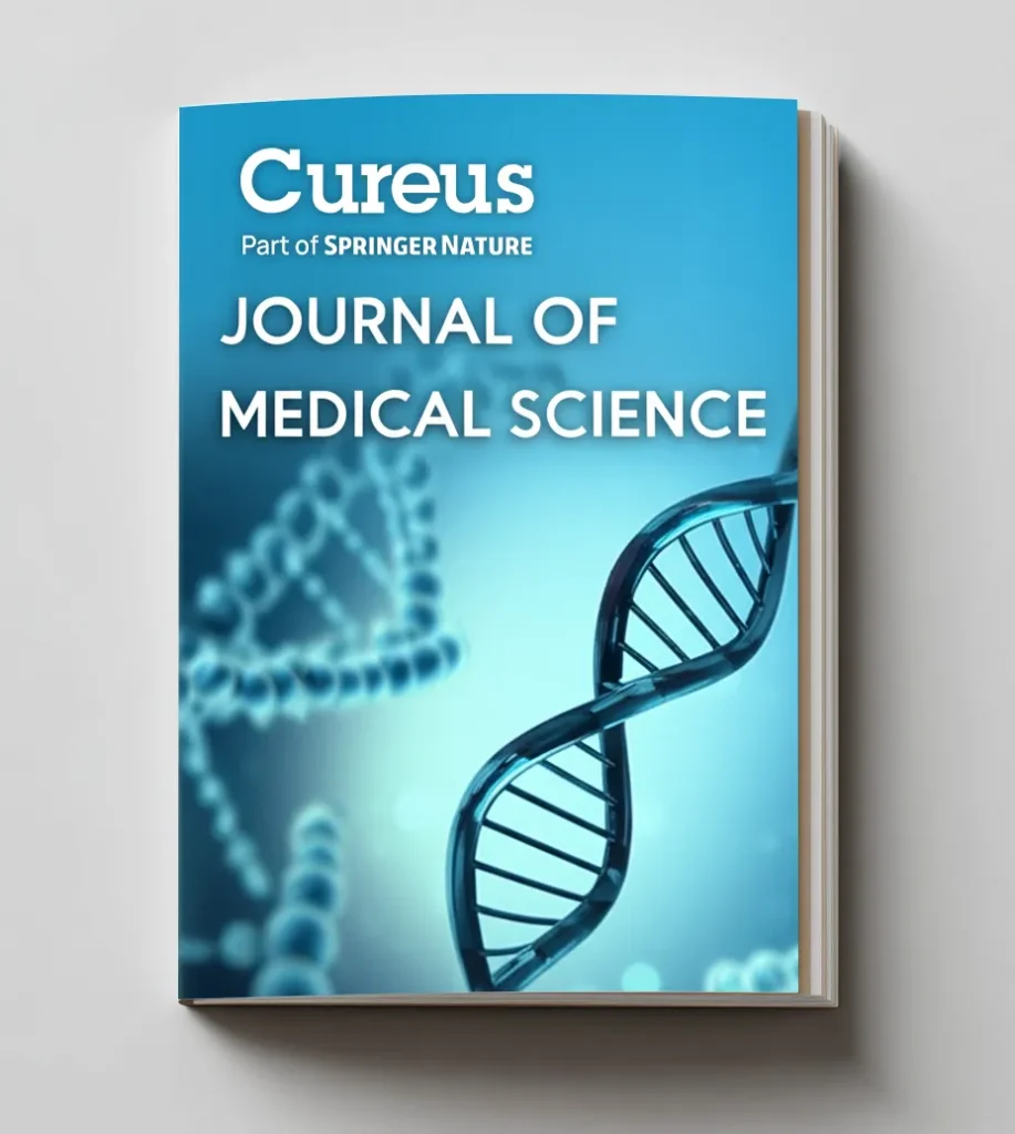 A medical journal titled "Cureus: Journal of Medical Science" with a blue cover featuring DNA double helix graphics and the text "Part of Springer Nature." The journal, focused on academic research, is lying on a light surface.