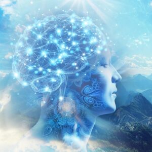 A digital representation of a human head with a glowing, interconnected network symbolizing a brain embodies the essence of Congruence 2025. The serene mountain landscape and bright sky in the background merge nature and technology, offering a full retreat experience for the mind.