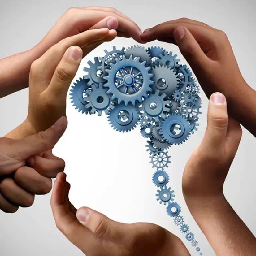 An illustration of a human brain made of blue gears, symbolizing a Neurosculpting journey. Diverse hands form the shape of a head, representing collaboration, innovation, and creativity. The light gradient background enhances this intermediate learning path's visual impact.